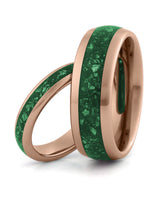 Matching rose gold tungsten wedding rings with emerald inlays, including an 8mm band