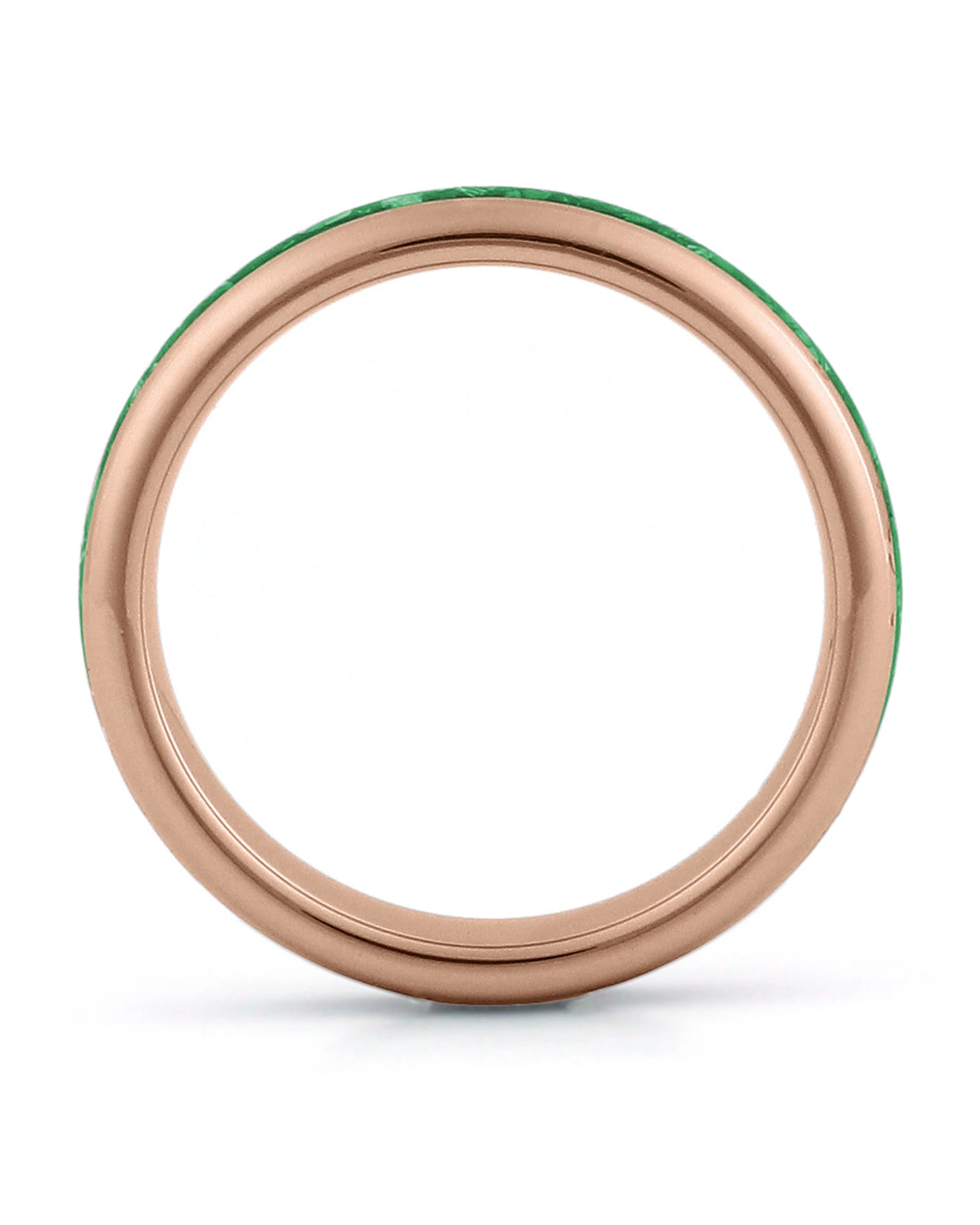 Side view of rose gold 4mm tungsten wedding ring with emerald inlay