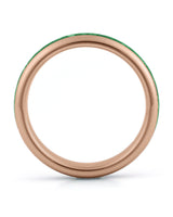 Side view of rose gold 4mm tungsten wedding ring with emerald inlay