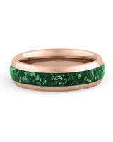 Rose gold 6mm tungsten ring with green emerald inlay shown at an angle