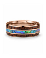 Koa wood and abalone shell tungsten ring lying flat showing the inlay detail