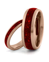 Matching rose gold tungsten wedding rings with ruby inlays, including an 8mm band