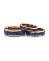 Rose gold sapphire tungsten couples wedding ring set shown together