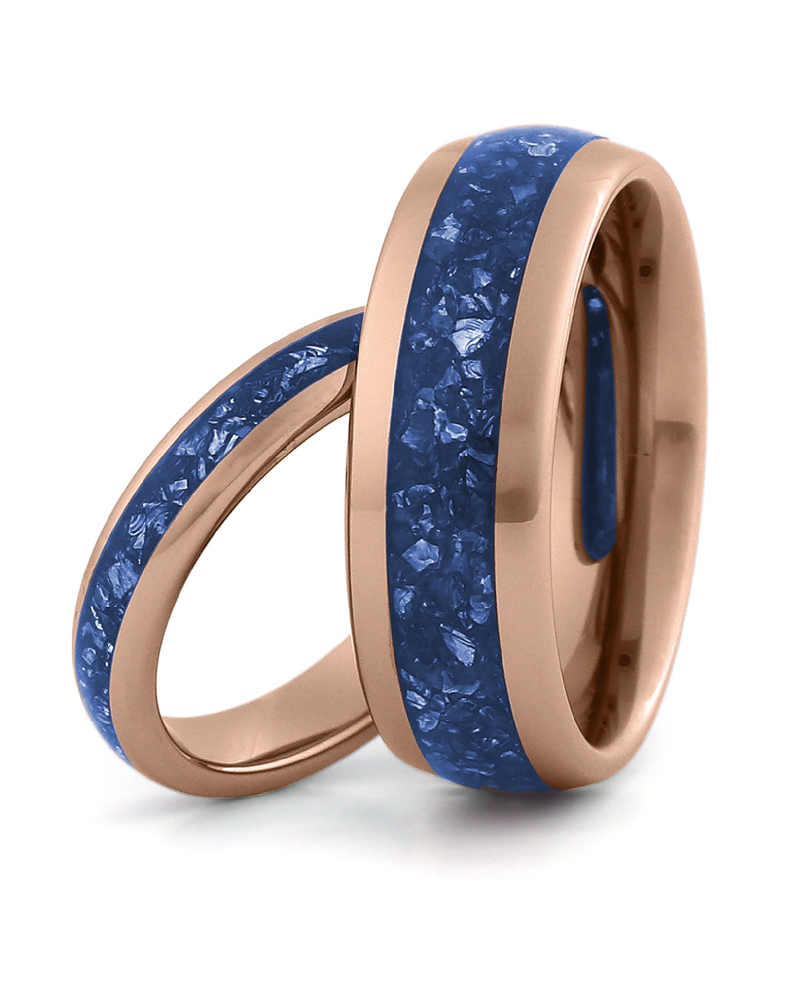 Matching rose gold tungsten wedding rings with sapphire inlays, including an 8mm band