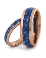 Matching rose gold tungsten wedding rings with sapphire inlays, including an 8mm band