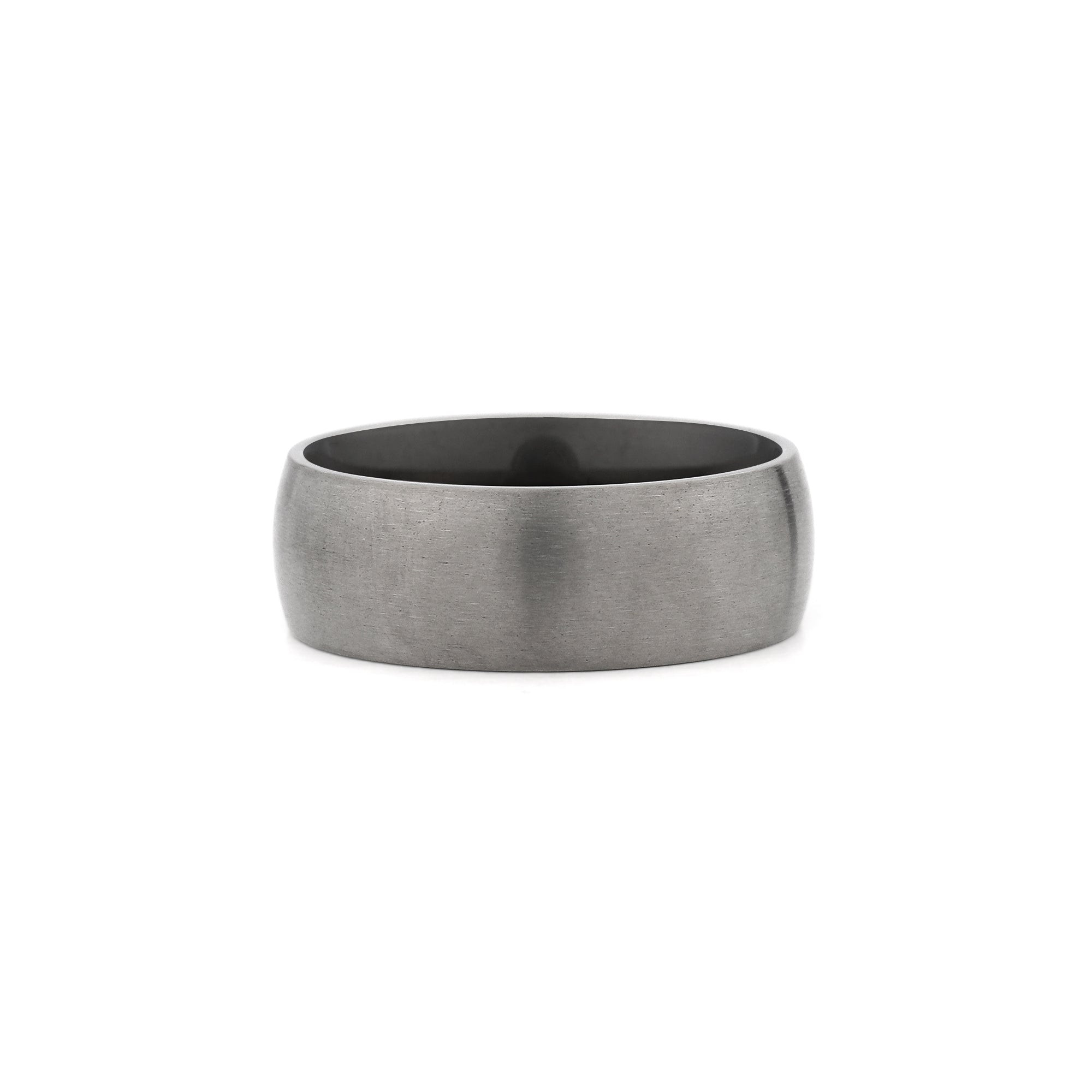 close up of a silver and black titanium ring