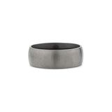 close up of a silver and black titanium ring