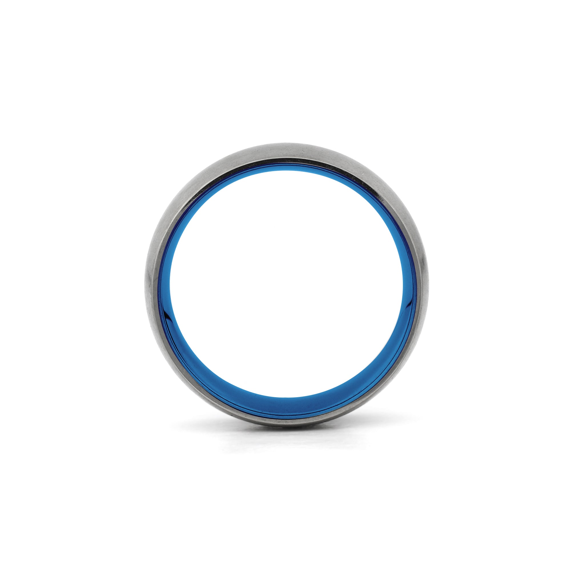 silver titanium ring with polished blue sleeve
