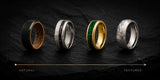 Men's wedding ring style comparison featuring whiskey barrel wood, meteorite, gemstone and hammered tungsten wedding bands arranged along a natural to textured style spectrum.