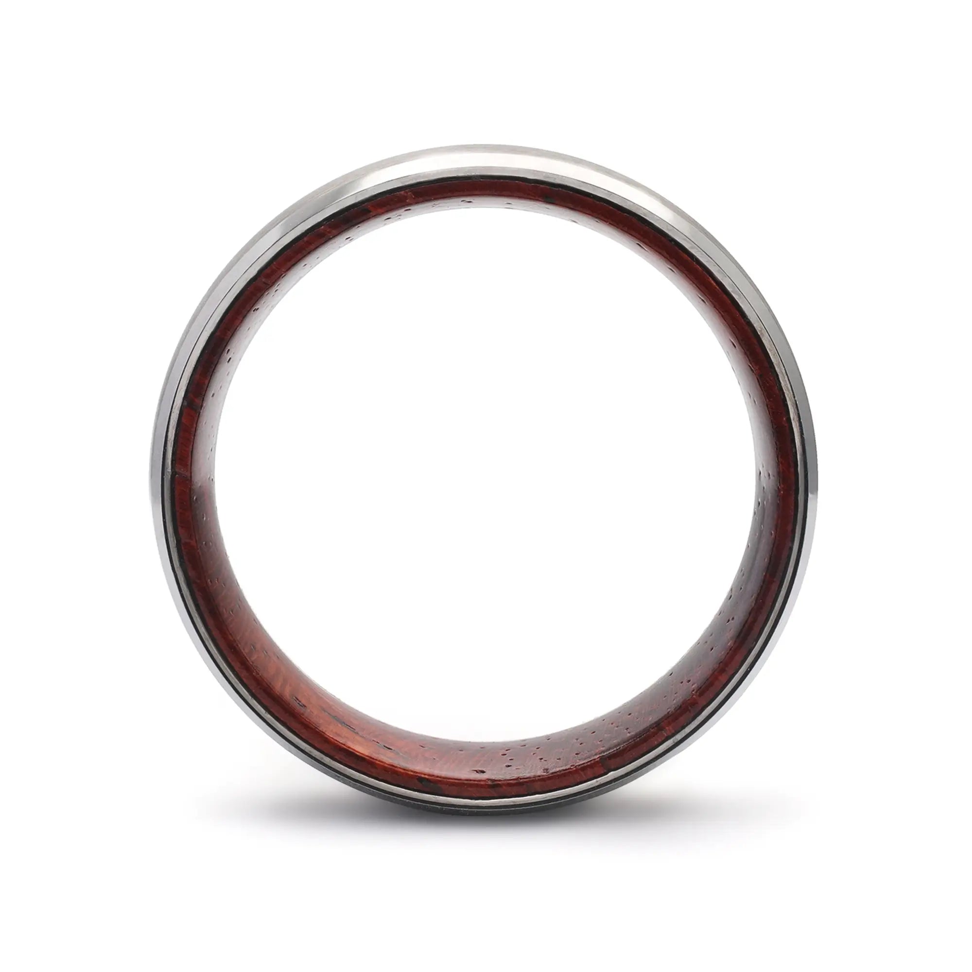 Side profile of a silver beveled tungsten whiskey barrel wedding ring with a reclaimed maple wood interior.
