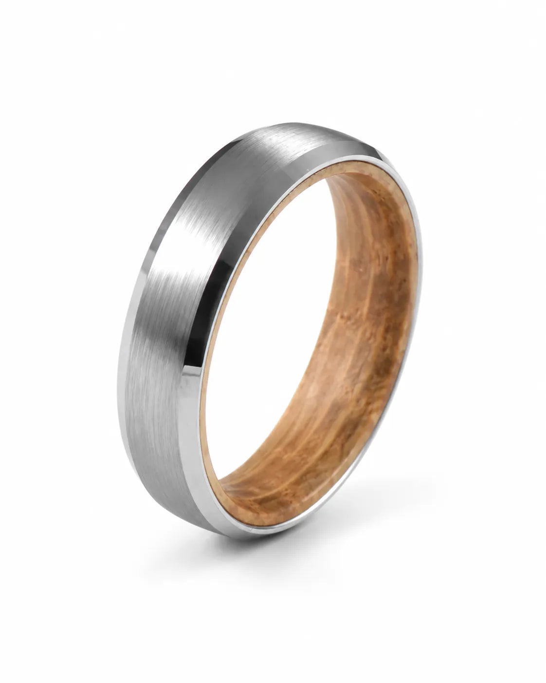 Silver beveled tungsten wedding ring with whiskey barrel wood inner sleeve shown at a 35 degree angle on a white background.