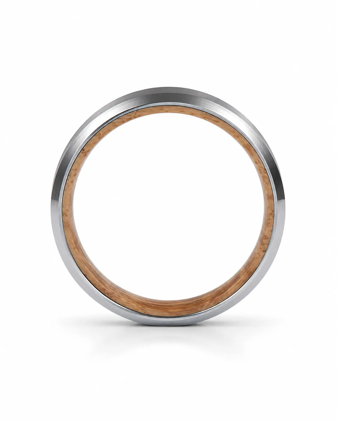Side profile of a silver beveled tungsten wedding ring with a whiskey barrel wood inner sleeve showing the band thickness.