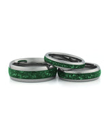 Silver emerald tungsten couples wedding ring set shown together
