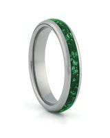 Silver 4mm tungsten ring with green emerald inlay shown at an angle