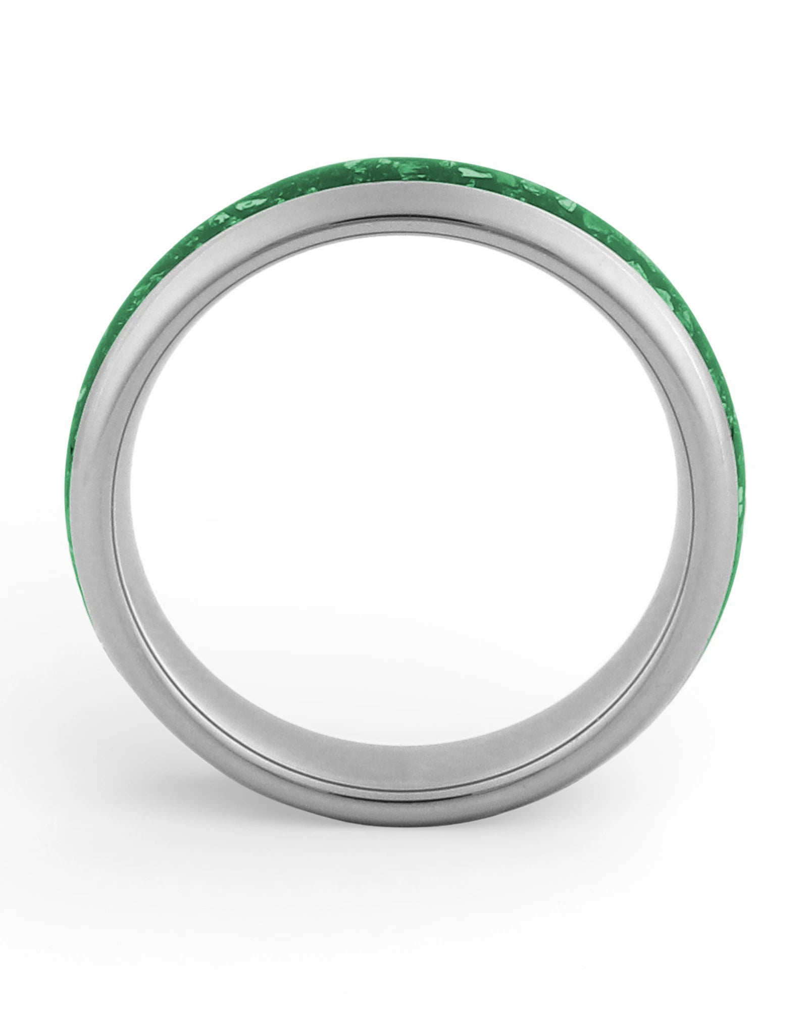 Side view of silver 6mm tungsten wedding ring with emerald inlay