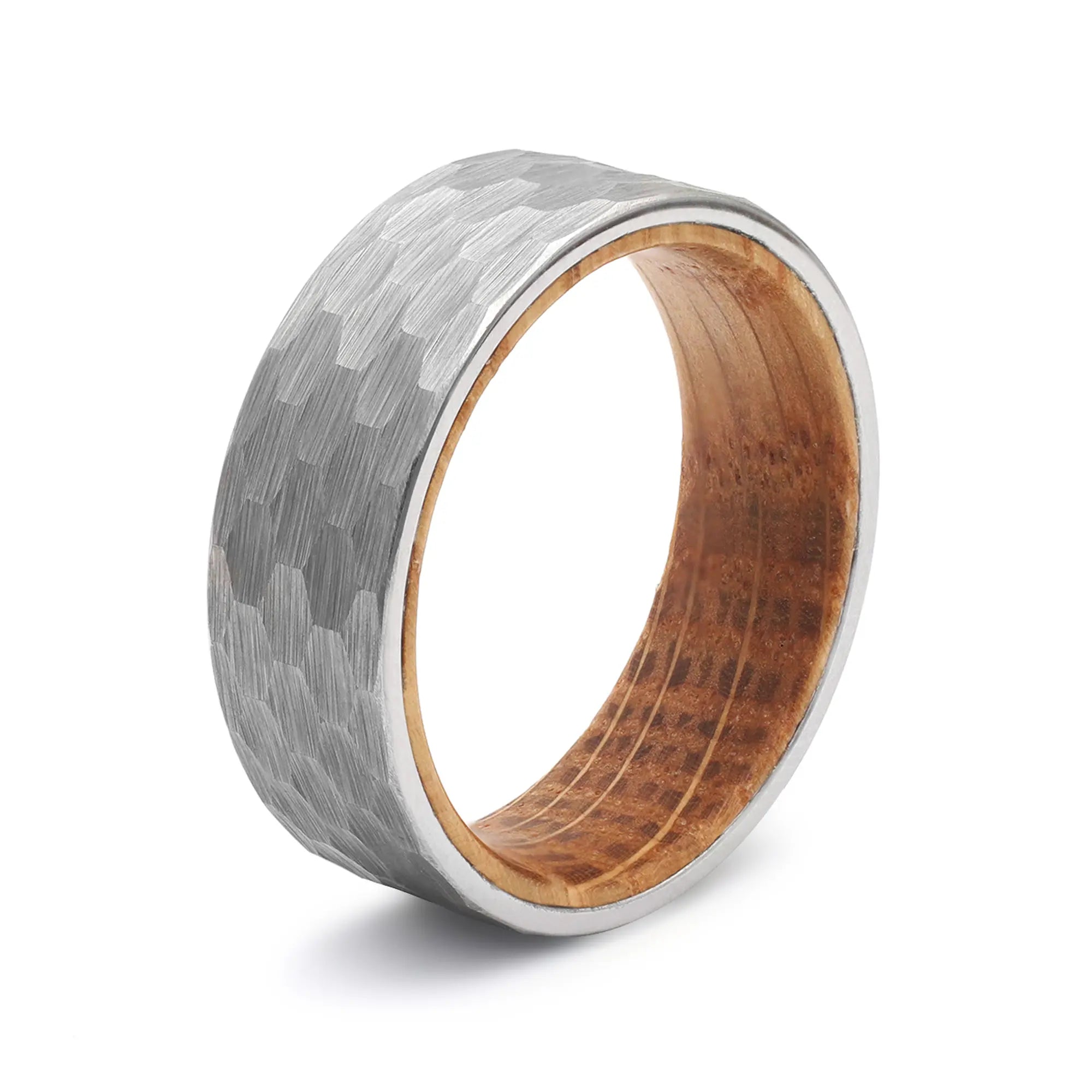 Silver hammered tungsten whiskey barrel wedding ring with a real oak wood interior.