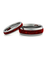 Matching silver wedding bands with red ruby stone inlays