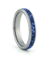Silver 4mm tungsten ring with blue sapphire inlay shown at an angle