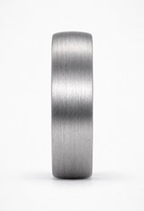 Front view of silver tungsten wedding ring with natural antler inner sleeve