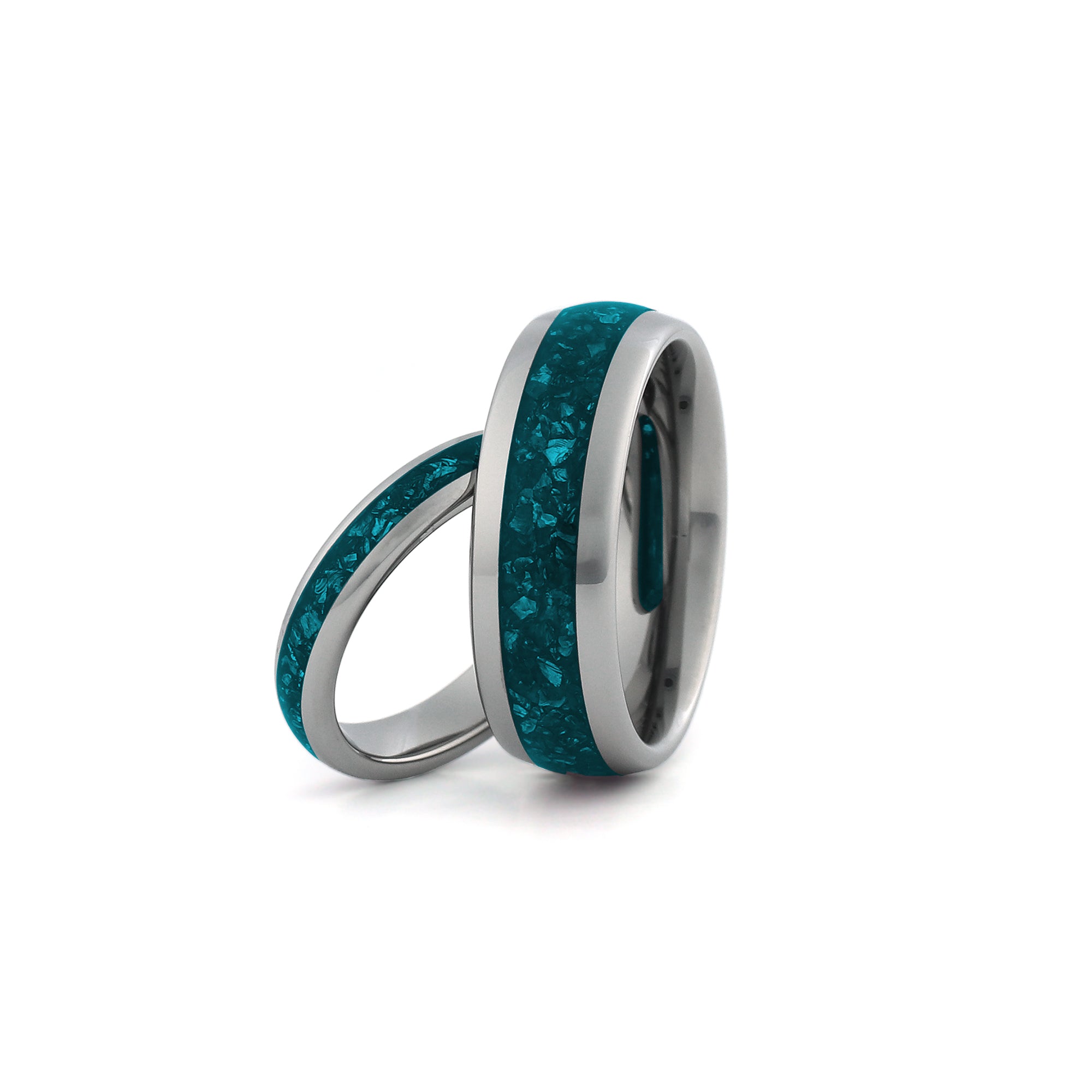 Turquoise couples rings in silver tungsten, matching his and hers wedding bands with turquoise inlay