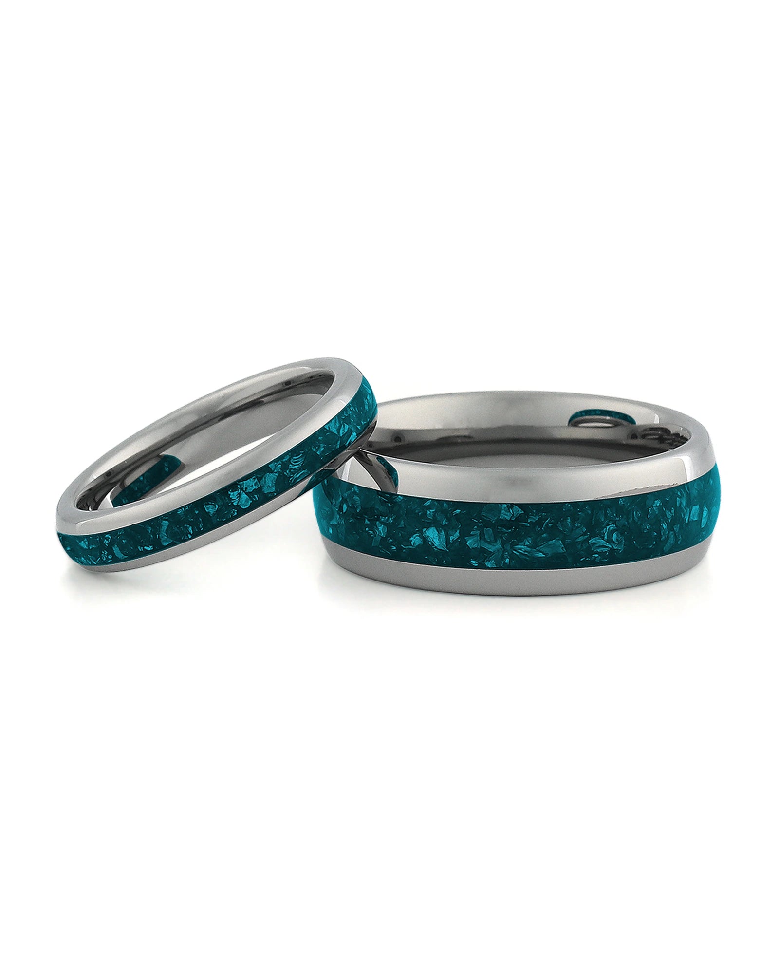 Matching silver wedding bands with turquoise stone inlays