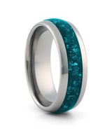 Silver 8mm tungsten ring with turquoise stone inlay shown at an angle