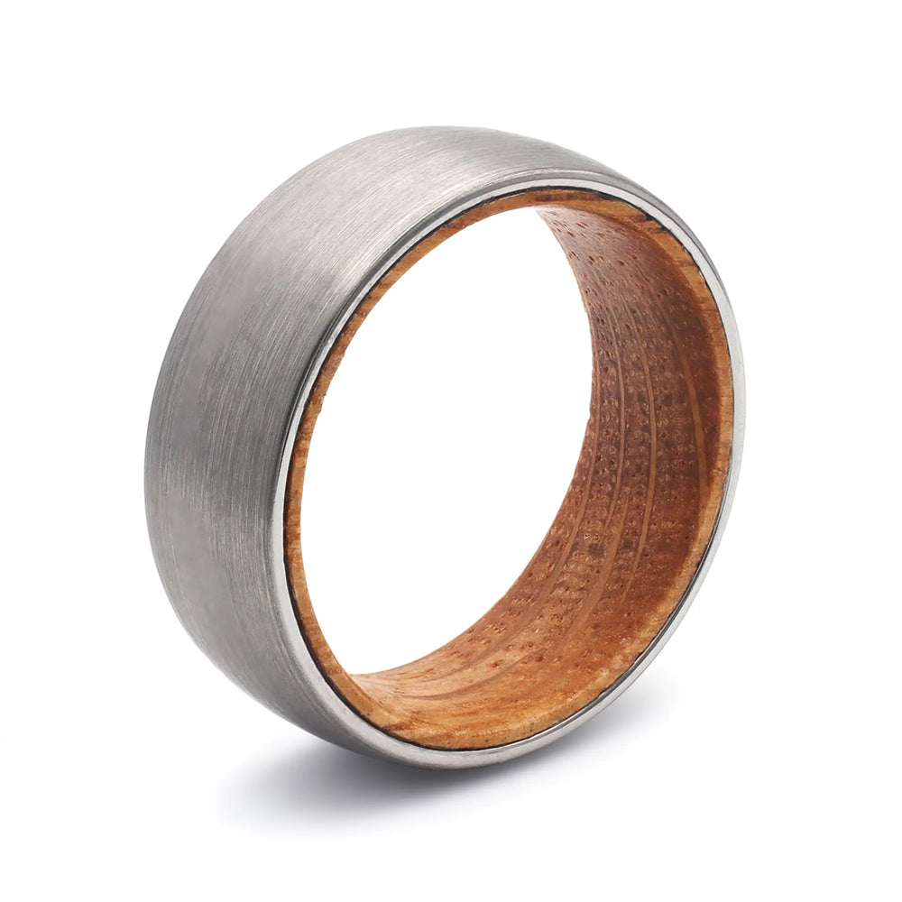 Silver tungsten whiskey barrel wedding ring with a real oak wood interior.