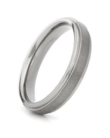 Silver 4mm stepped titanium wedding ring shown at an angle