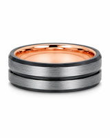 Silver brushed tungsten wedding ring with polished black groove, black edges and rose gold comfort fit interior.