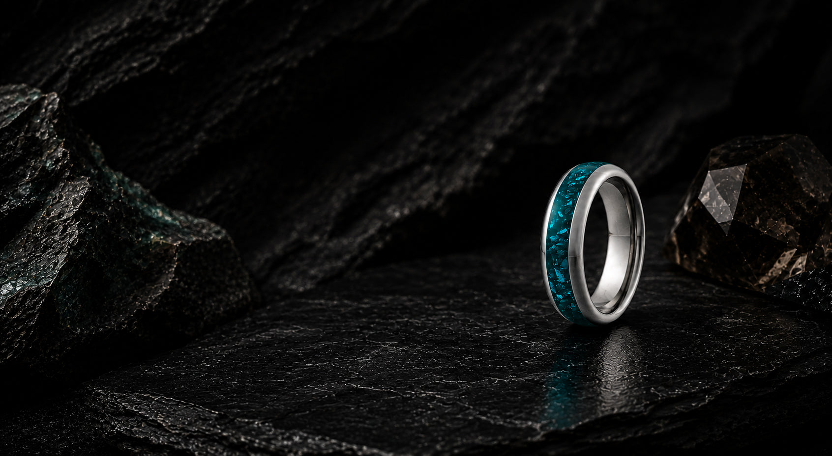 Luxury turquoise gemstone wedding ring hero banner with dark slate background and cinematic lighting