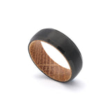 tungsten and oak wood mens wedding ring with beveled sides falling view